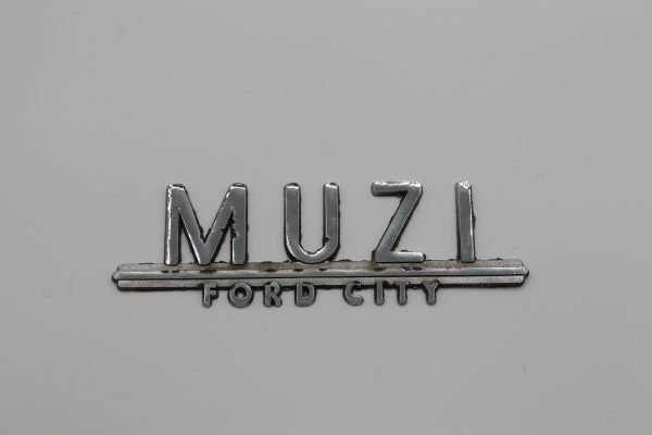 Muzi Ford City Dealer Emblem - Metal
