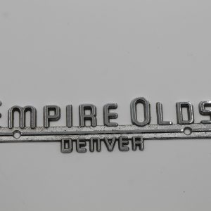 Empire Olds. Oldsmobile Dealer Emblem Denver - Metal