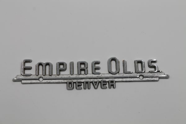Empire Olds. Oldsmobile Dealer Emblem Denver - Metal